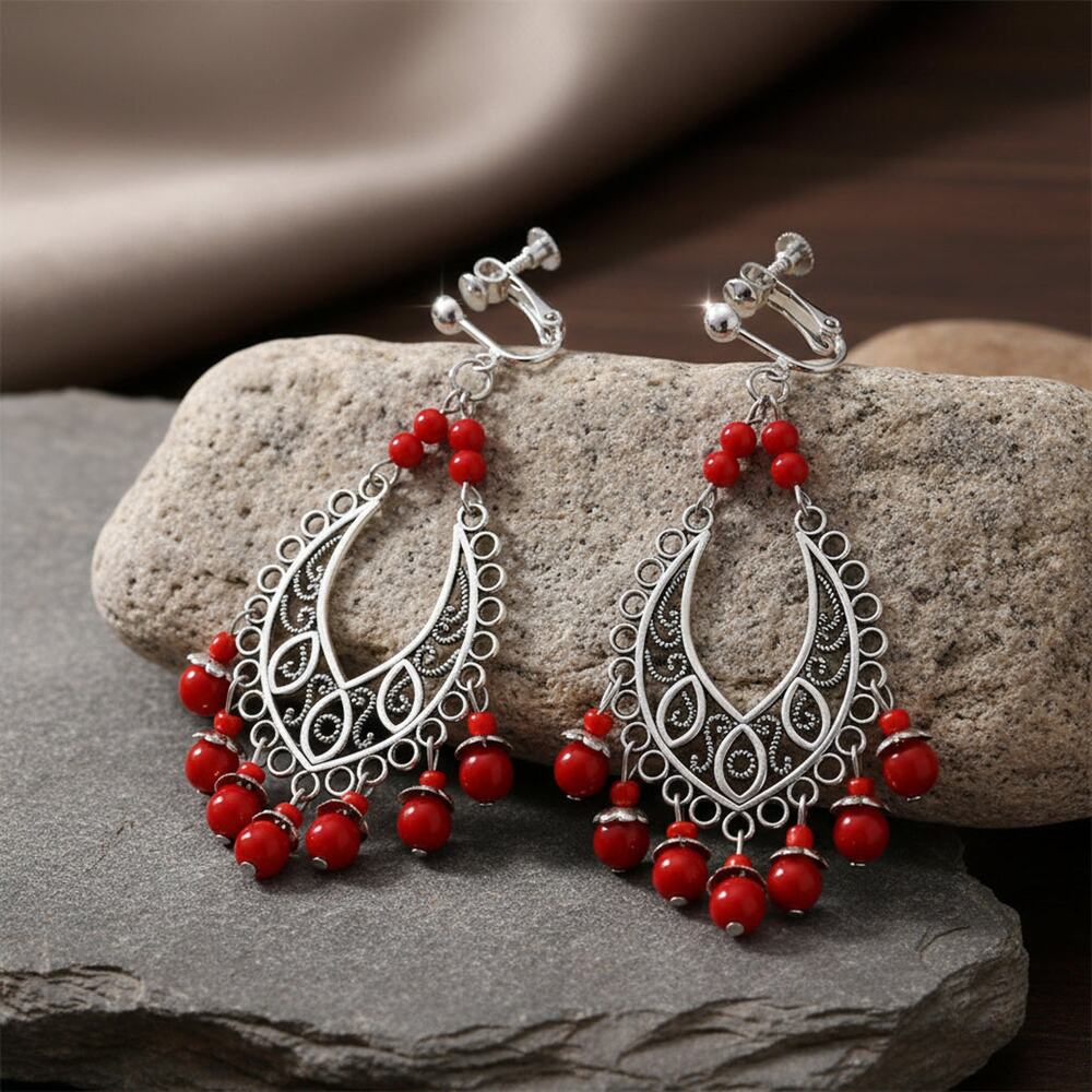 Copied - Clip on 3 1/4" long silver cutout and red bead dangle earrings